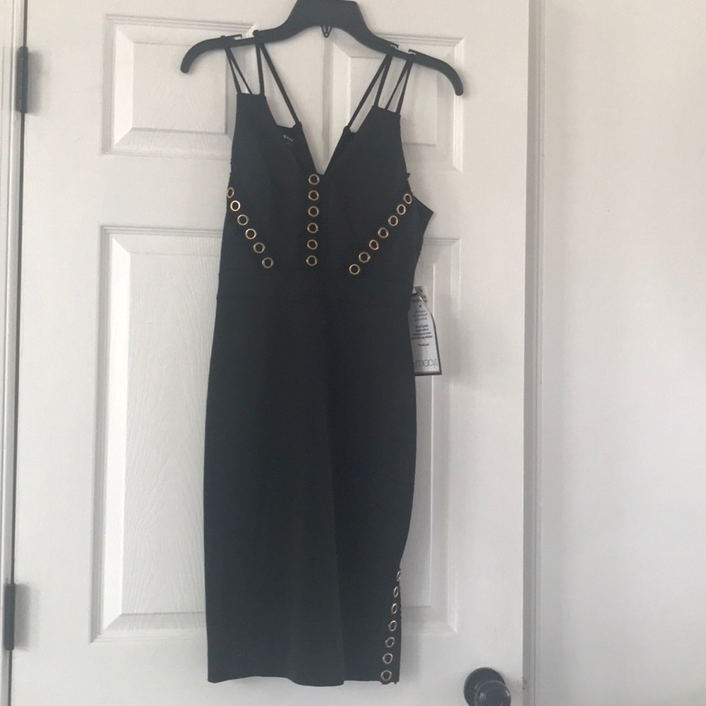 Black dress with round bronze studs